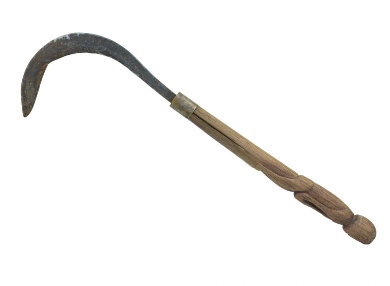 เคียวแกะสลักด้ามรูปคน